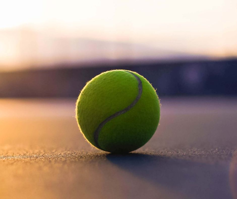 tennis ball on tennis court Forest Glen